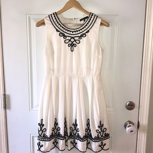 C. Luce dress, white and black fit and flare